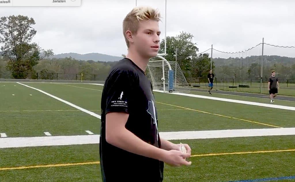 student at the turf field