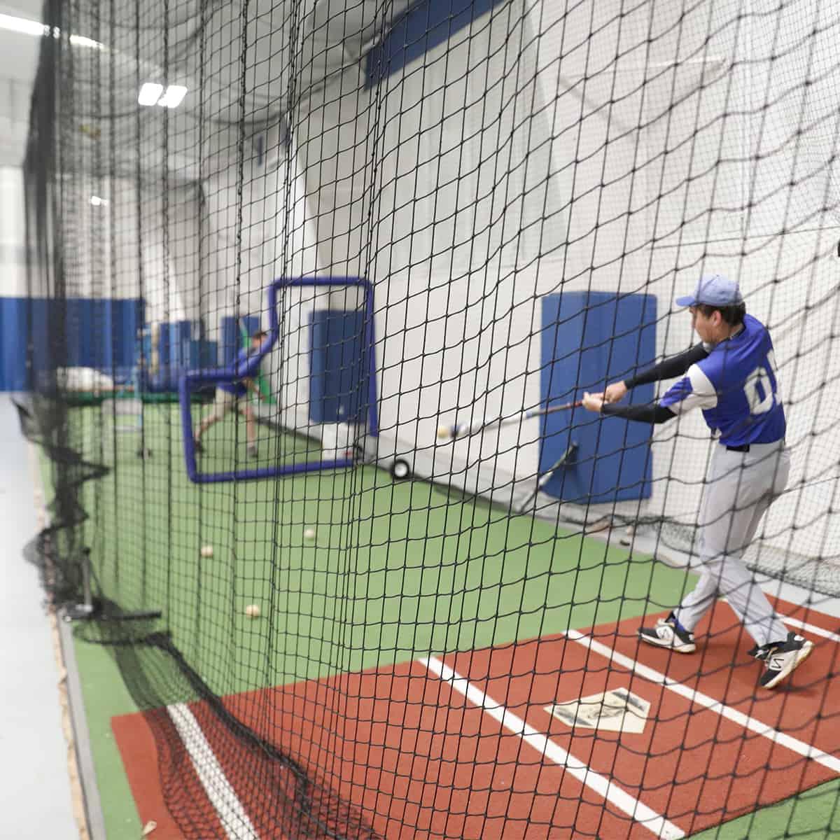 baseball player in the batting cage